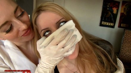 nurse in surgical gloves puts to sleep a villainess with chloroform